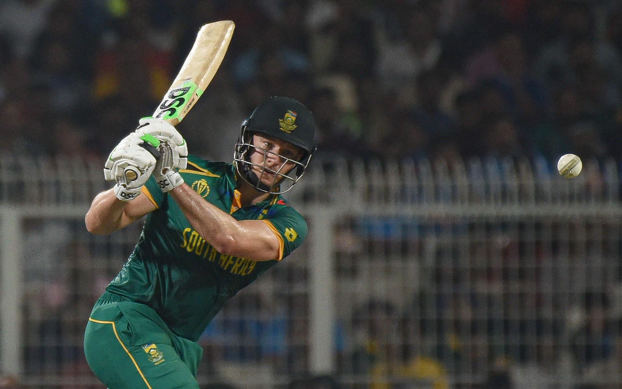 a cricketer plays a shot