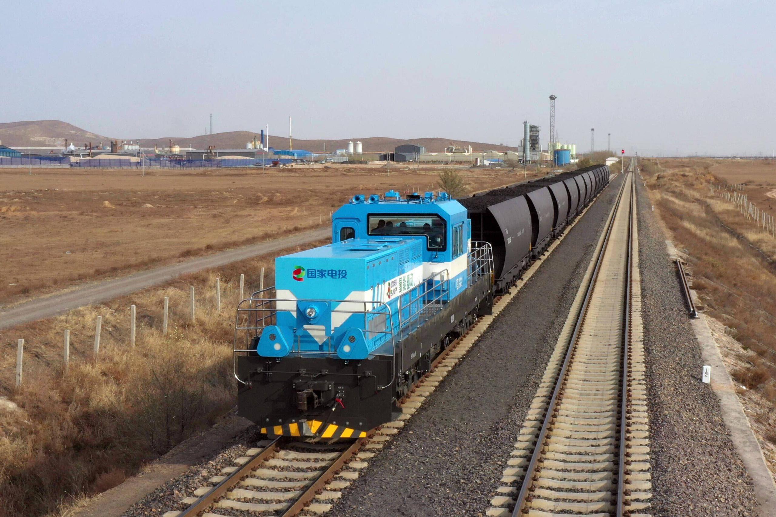 A blue train on a track