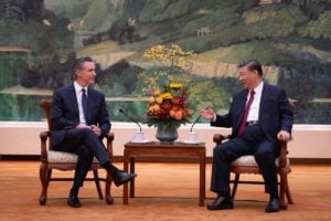 California’s state governor, Gavin Newsom and President Xi Jinping sitting in chairs and talking