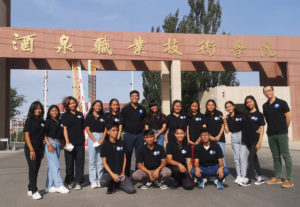 <p>A cohort of “new energy engineering” students from the Philippines outside Jiuquan Vocational and Technical College, in Gansu, north-west China, September 2023 (Image: People of Asia for Climate Solutions)</p>