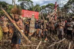 <p>In 2023, the Awyu people of Indonesian Papua filed a lawsuit challenging the issuance of a permit for an oil palm plantation on their ancestral lands. Their claim was <a href="https://www.greenpeace.org/southeastasia/press/62817/verdict-a-setback-for-awyu-indigenous-people-and-papuan-forests/">rejected</a>. (Image: © Jurnasyanto Sukarno / Greenpeace)</p>
