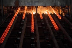 Glowing red hot steel bars
