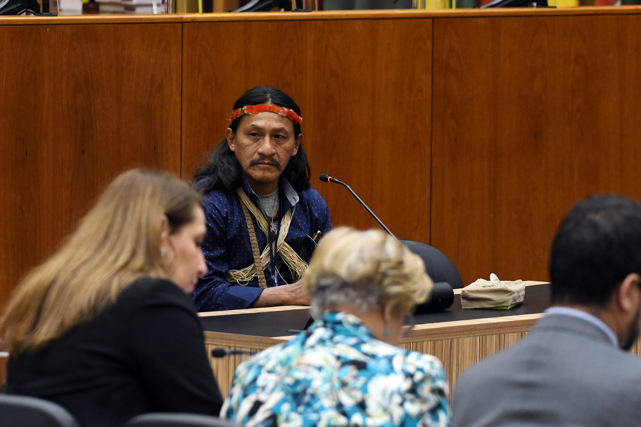 man behind stand at court