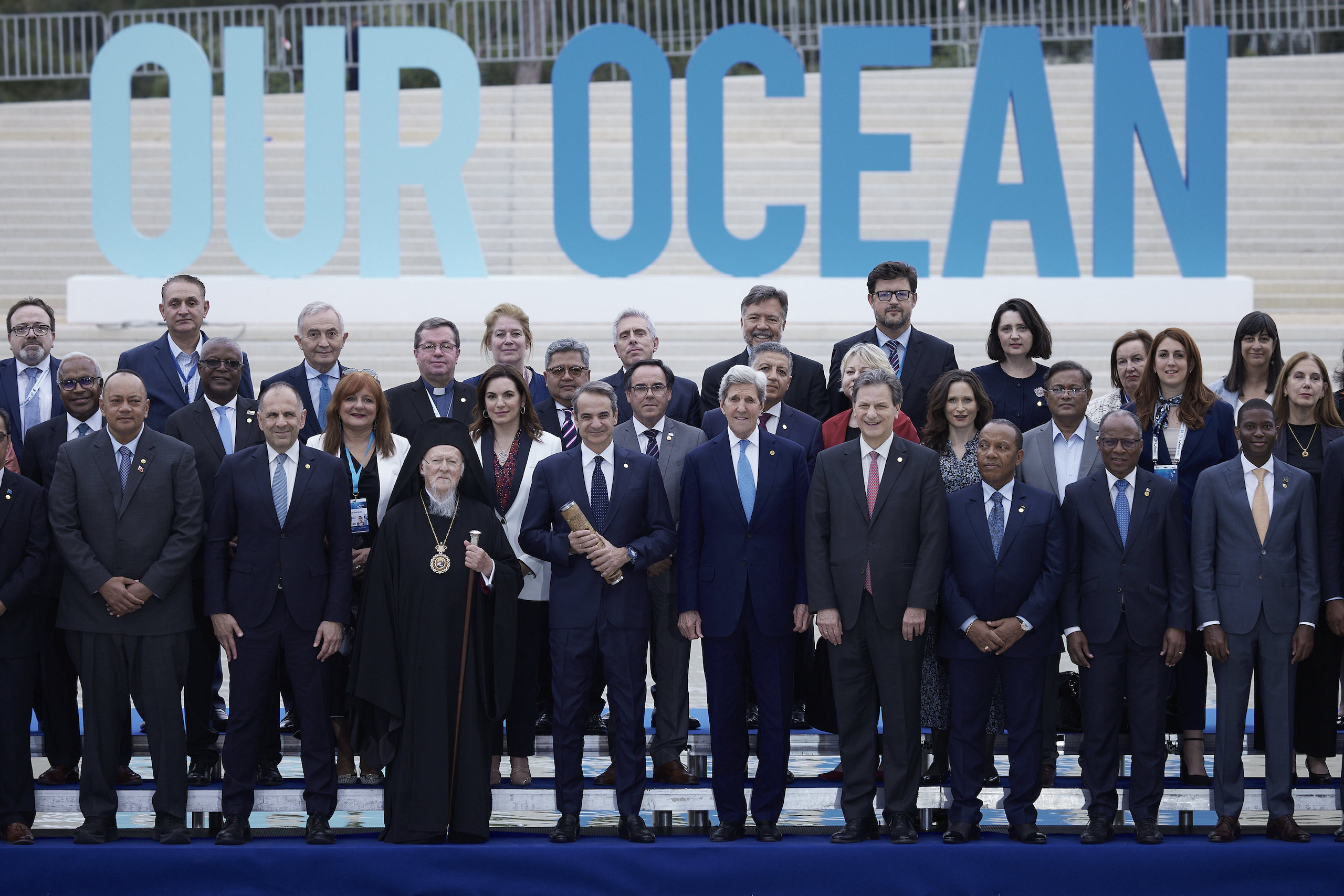 A group of world leaders standing together for taking photos