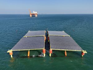 <p>An experimental solar power station on the Yellow Sea near Yantai, north-east China. Solar farms at sea may make it easier to serve China’s densely populated coastal cities with clean energy. (Image: Tang Ke / Alamy)</p>