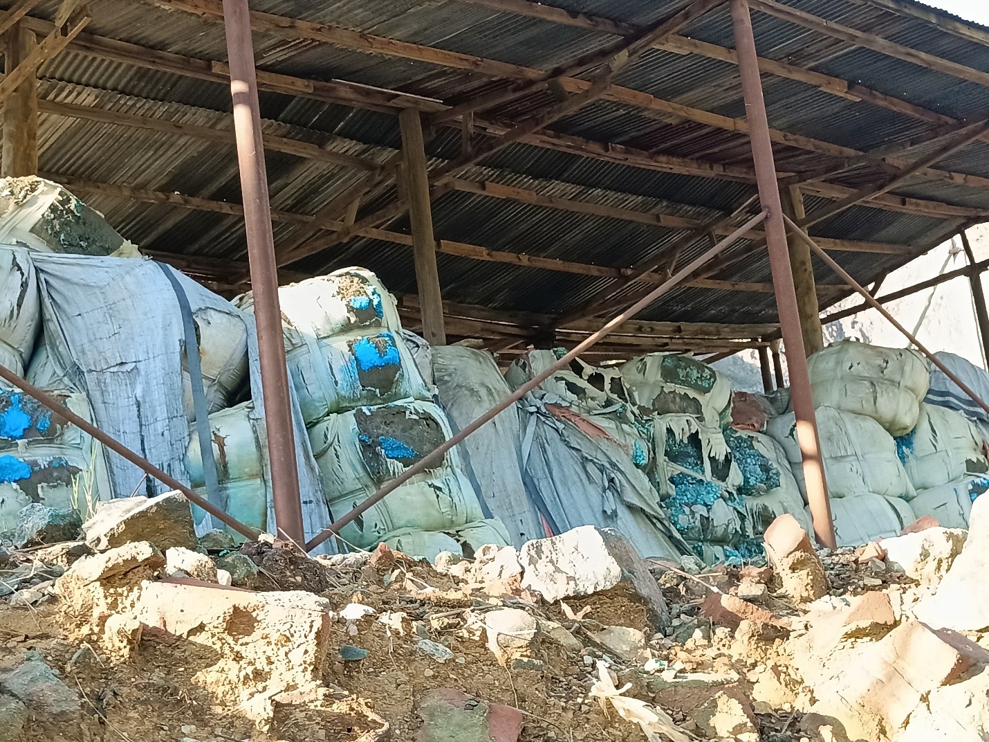 white sacks of copper ore