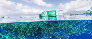 Ghost fishing nets, fishing nets and plastic bottles floating on the sea