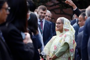 Prime Minister Sheikh Hasina interacting with people in suits