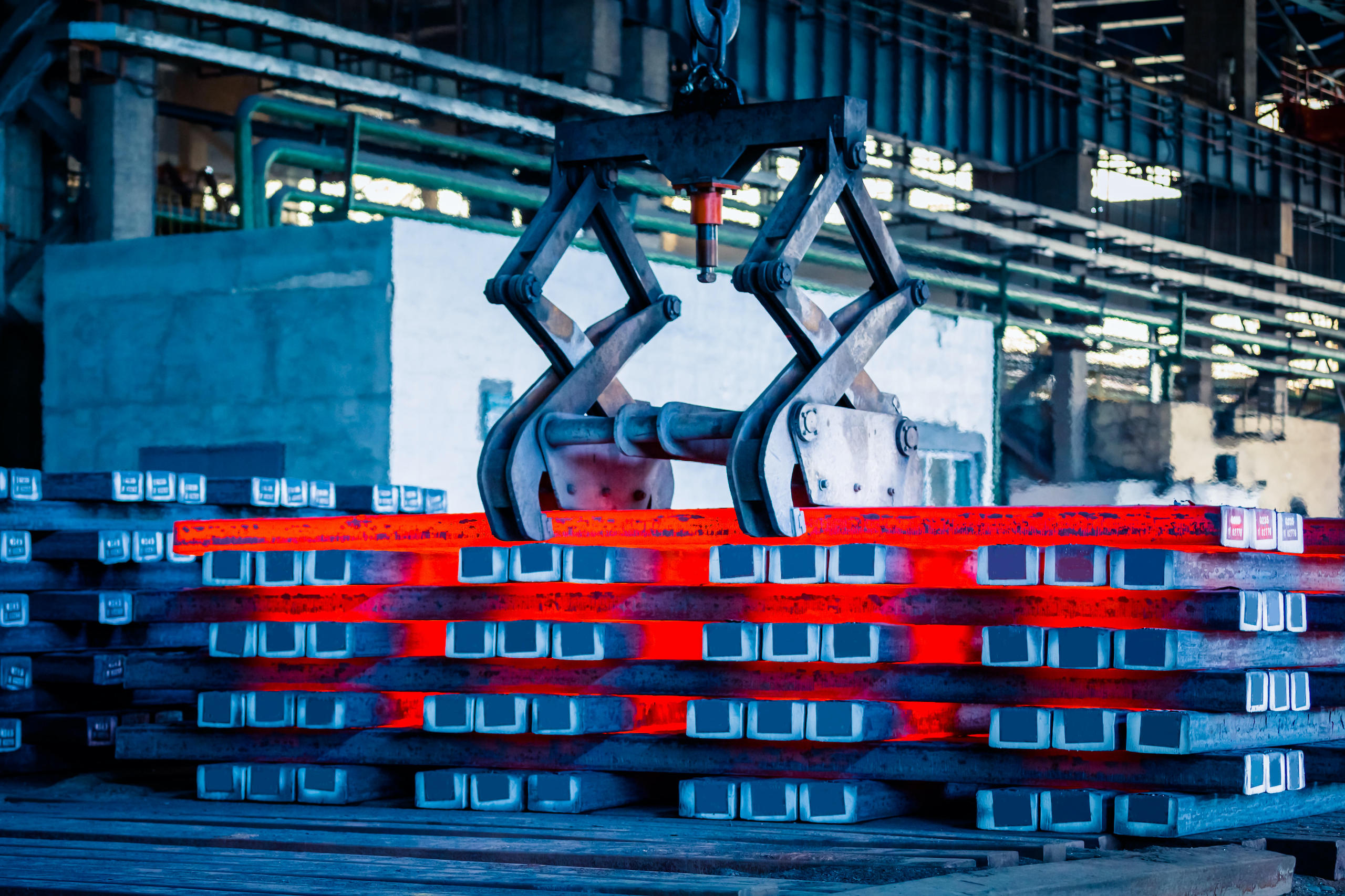 A pile of steel bars in a factory