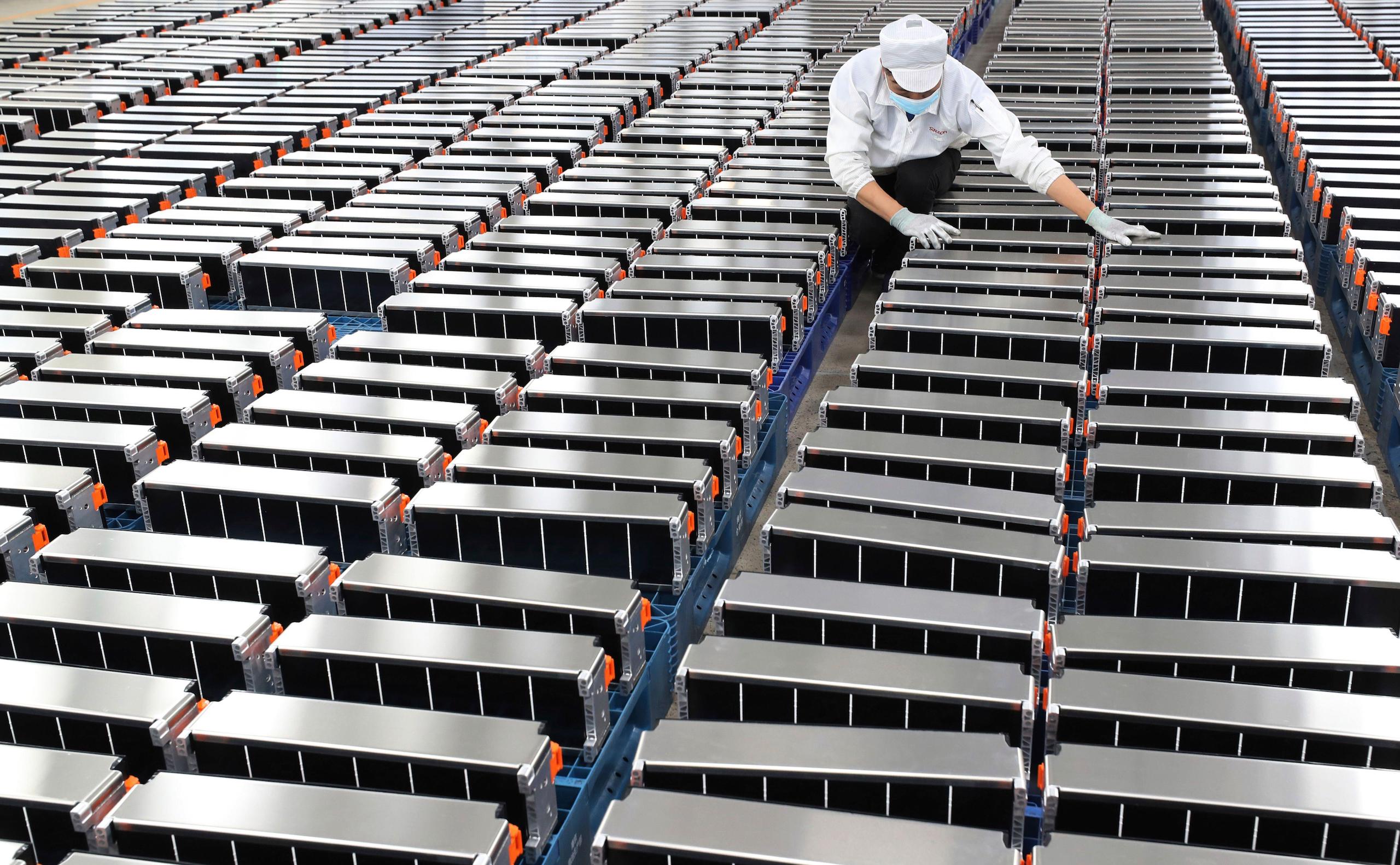 <p>Battery packs at a factory for electric vehicle batteries in Nanjing, east China (Image: Xu Congjun / FeatureChina / Associated Press / Alamy)</p>