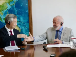 two men seated at desk