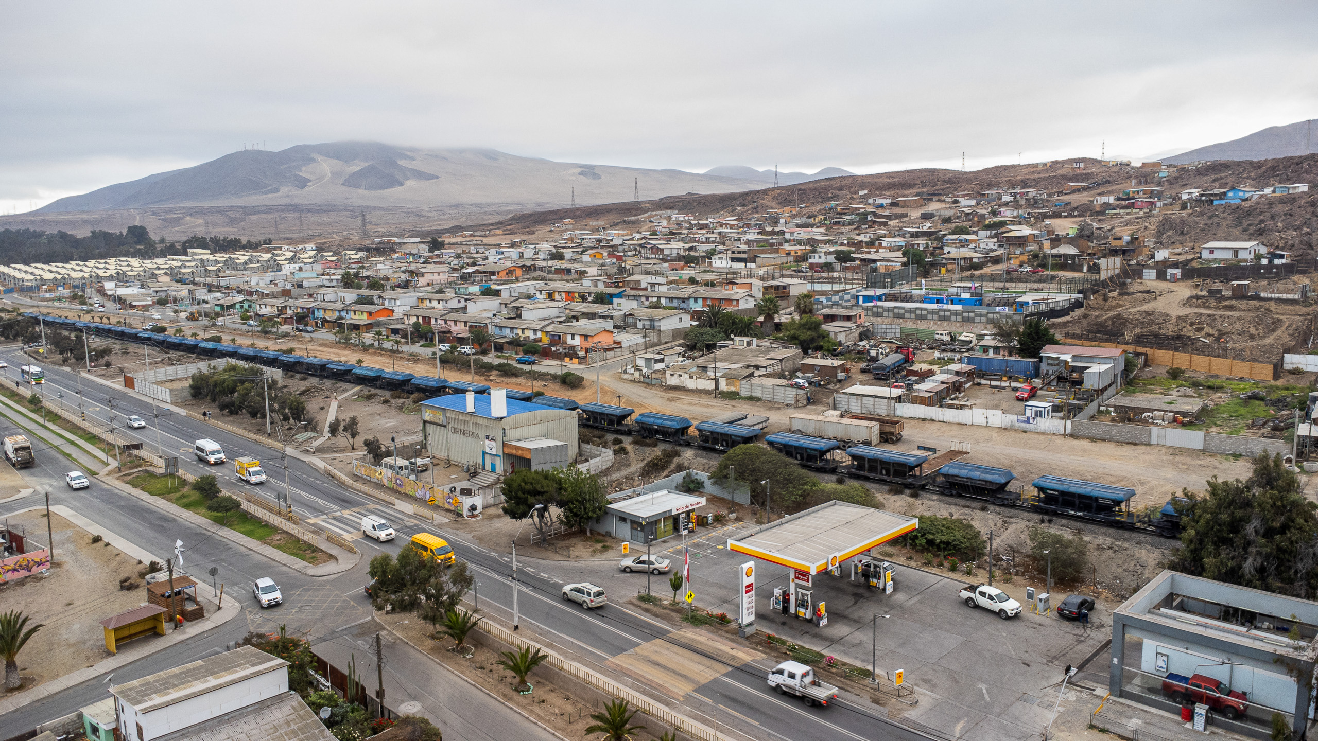 aerial view of busy road running through town