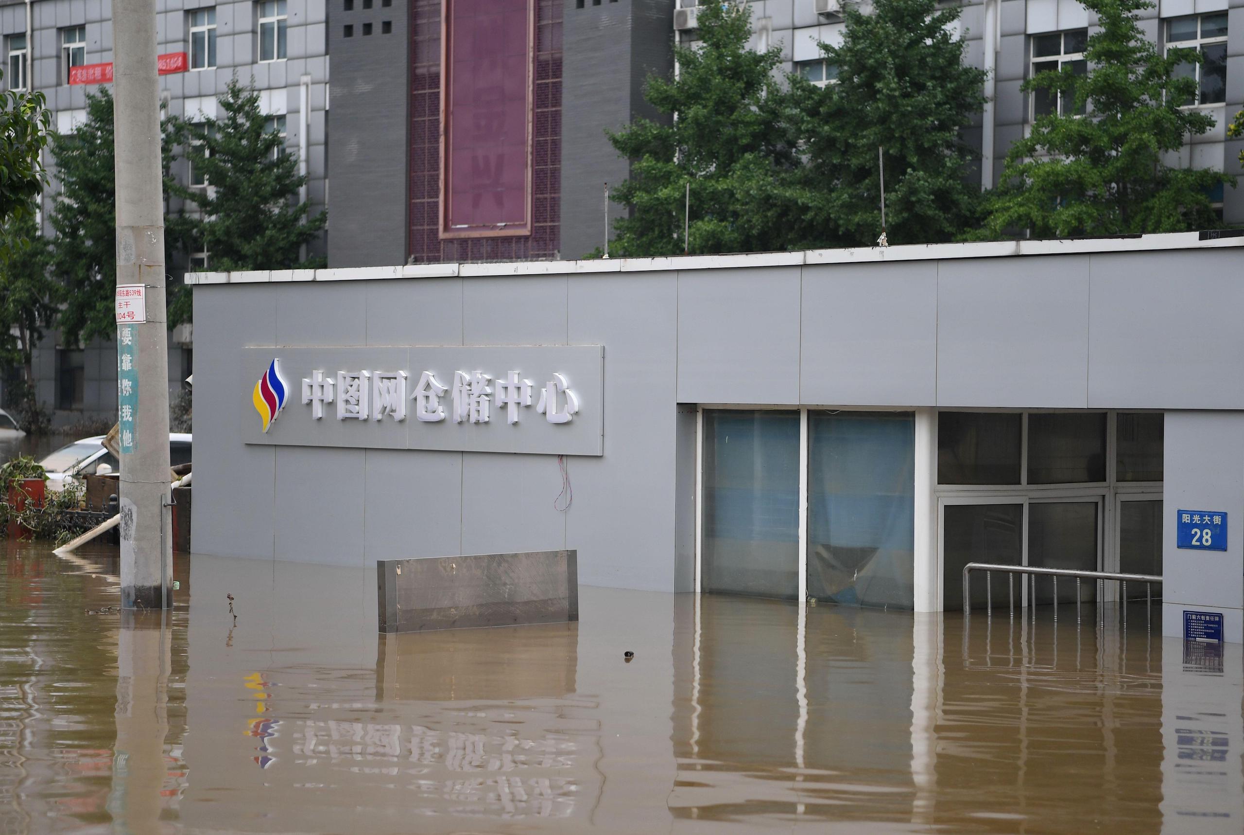 Floodwaters engulfing a book storage hub