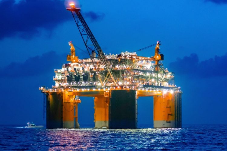 oil platform on sea at night