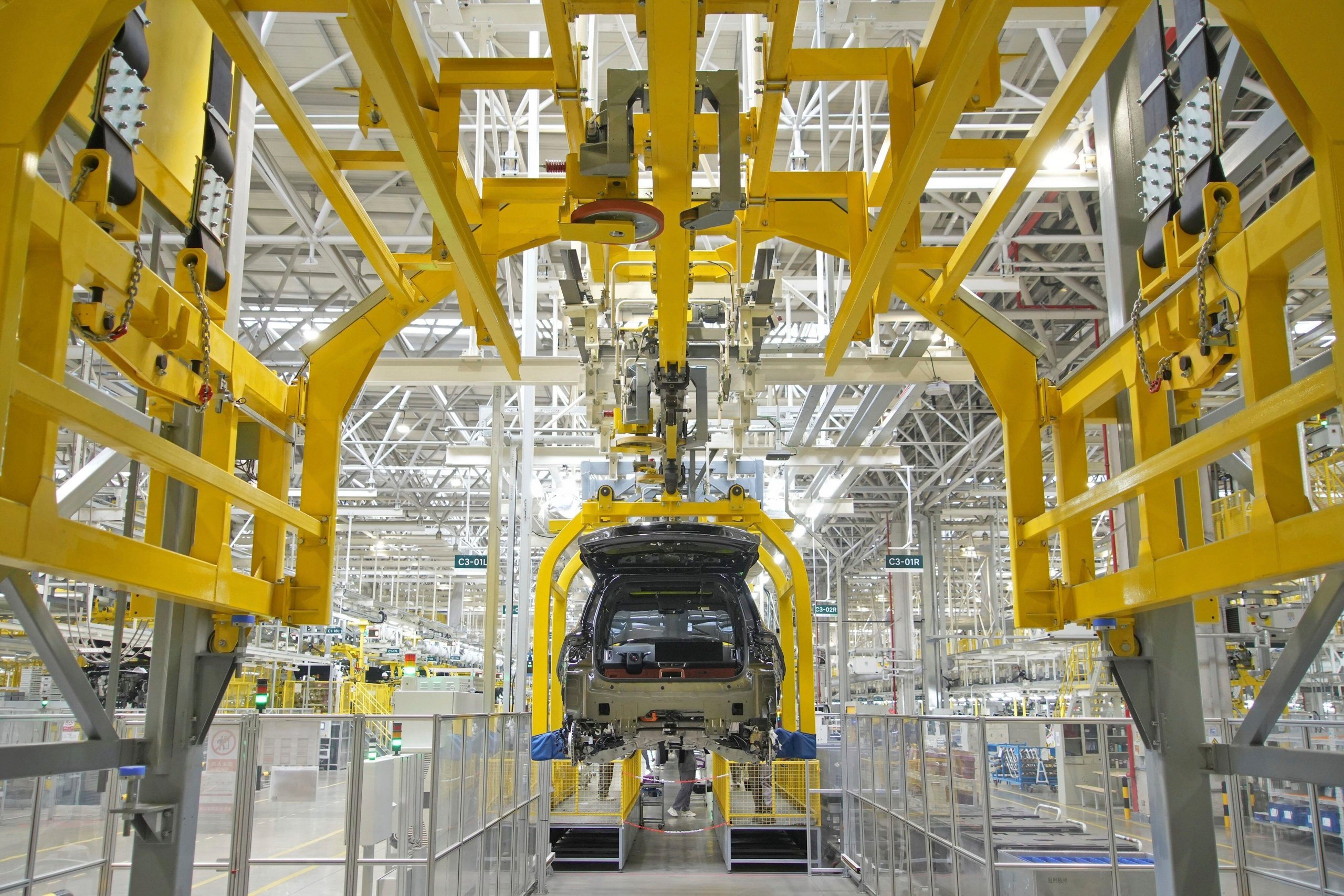 <p>An SUV is assembled at a car factory in Changzhou, Jiangsu province (Image: Associated Press / Alamy)</p>