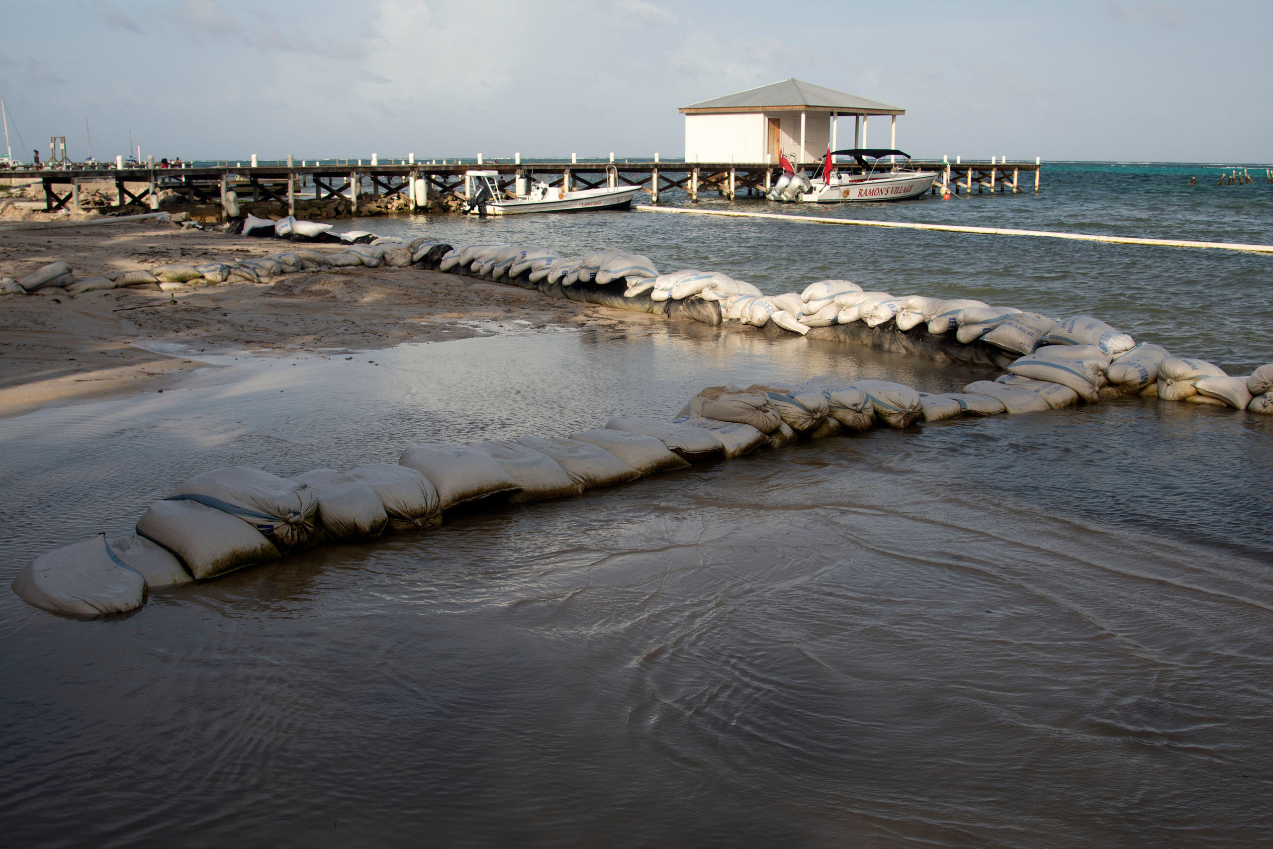 Sand bags lined along beach