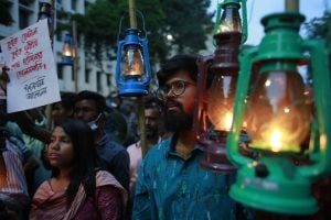 group of protester with lanterns and signs