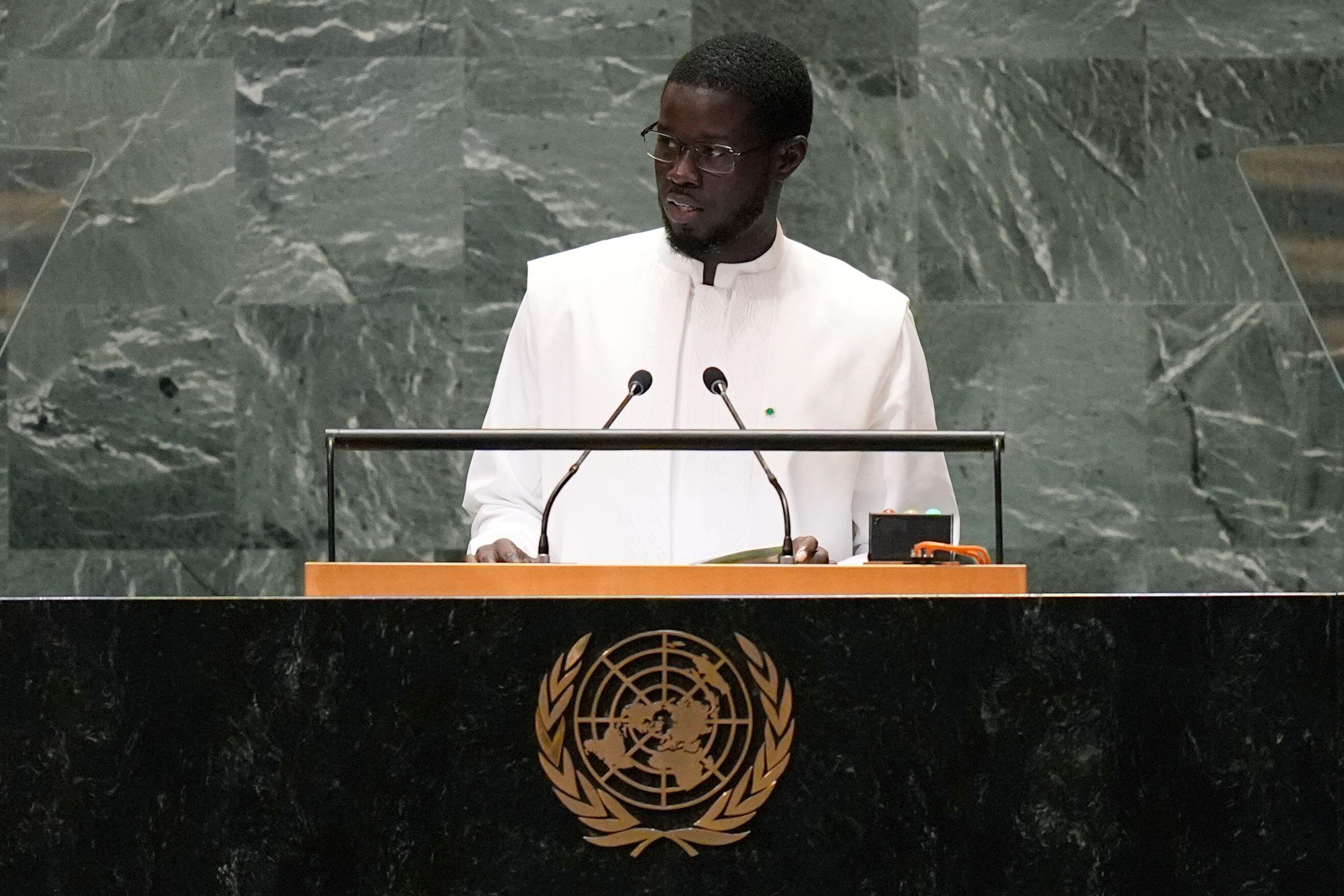 Bassírou Diomaye Diakhar Faye behind podium