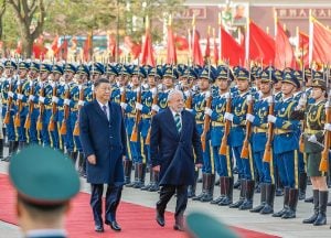 China's leader and the Brazil's president walk side by side at the ceremony