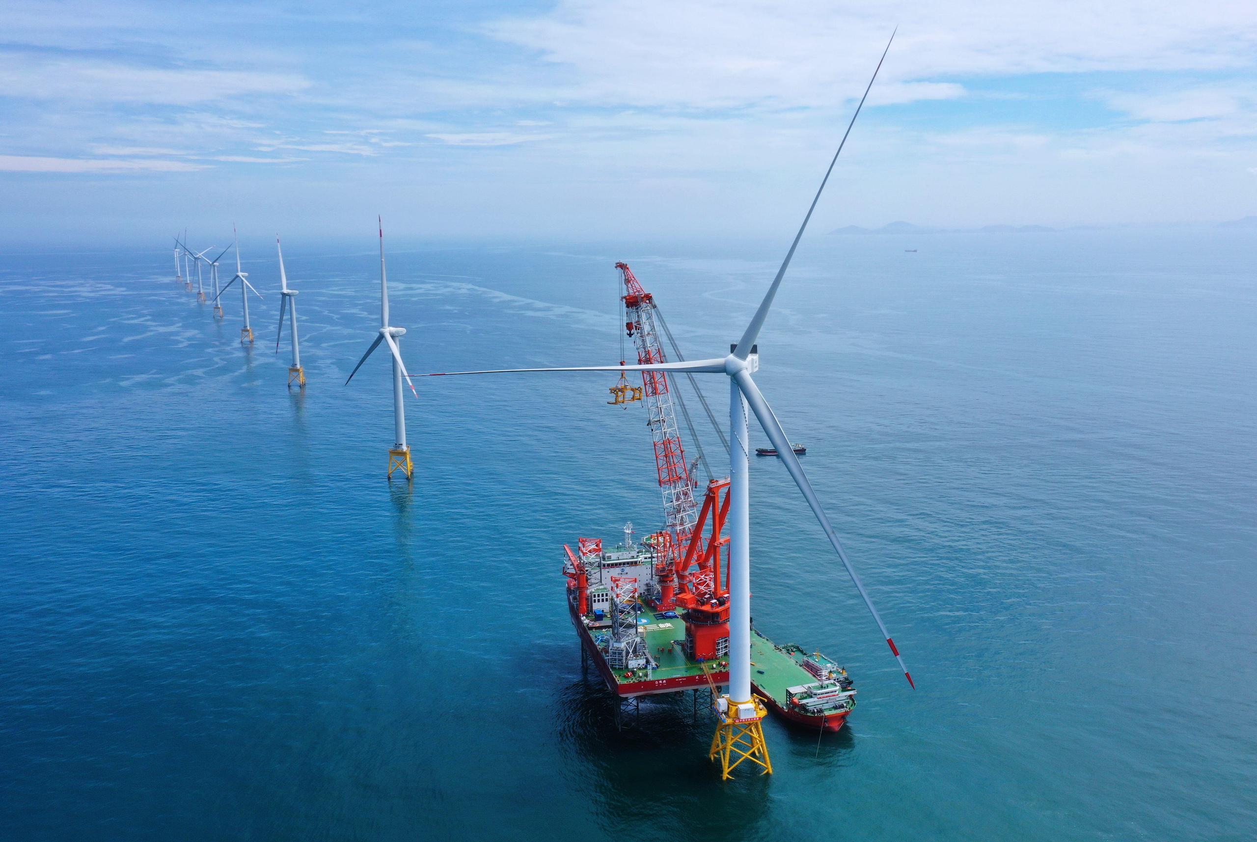 <p>A 16-megawatt wind turbine being installed off the coast of Fujian, east China, in 2023. Recent policy changes aimed at expansion mean China’s Green Electricity Certificates scheme now incorporates offshore wind power generators (Image: Lin Shanchuan / Xinhua / Alamy)</p>