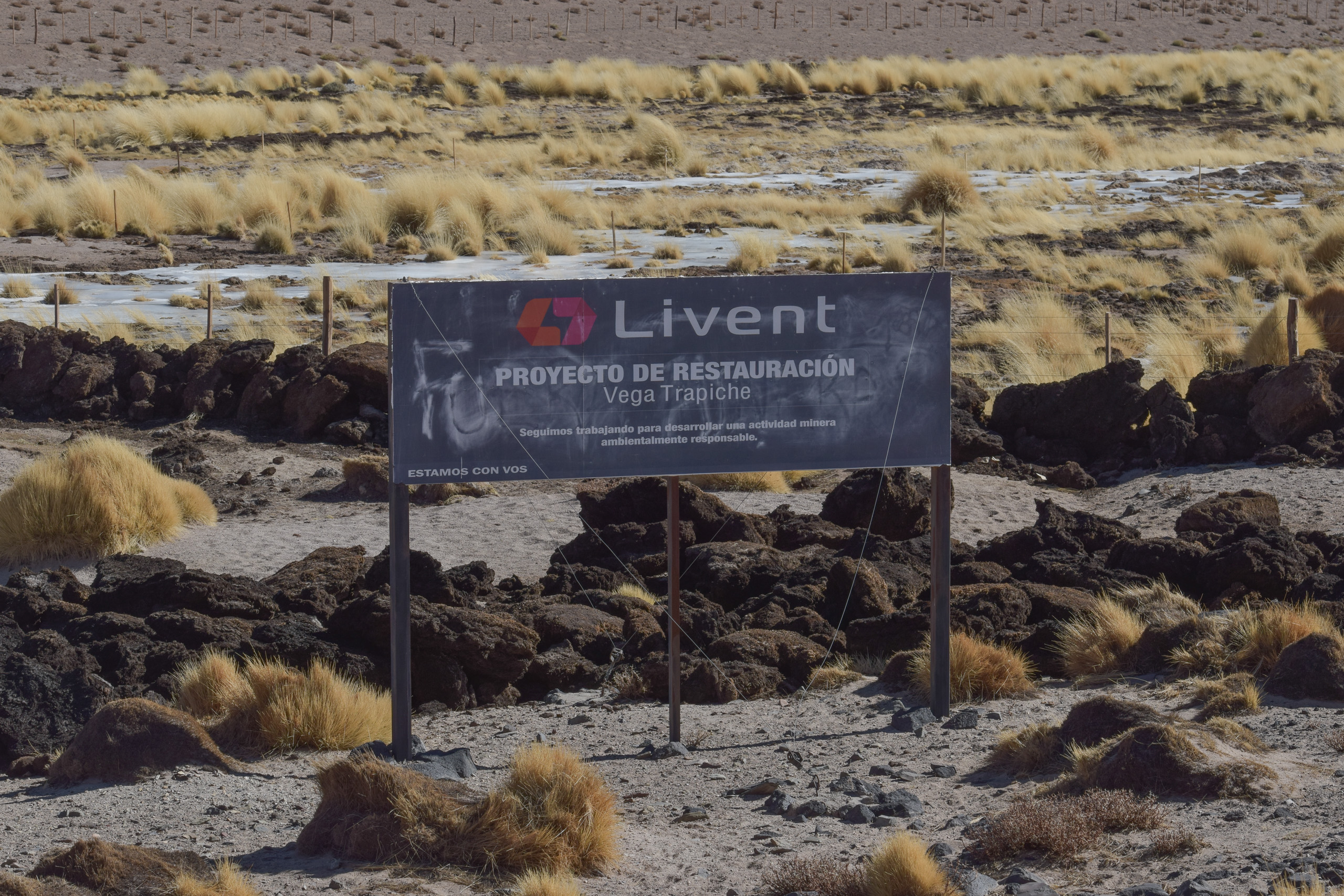 billboard in open rocky area