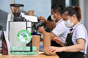 baristas work at a zero carbon coffee stand