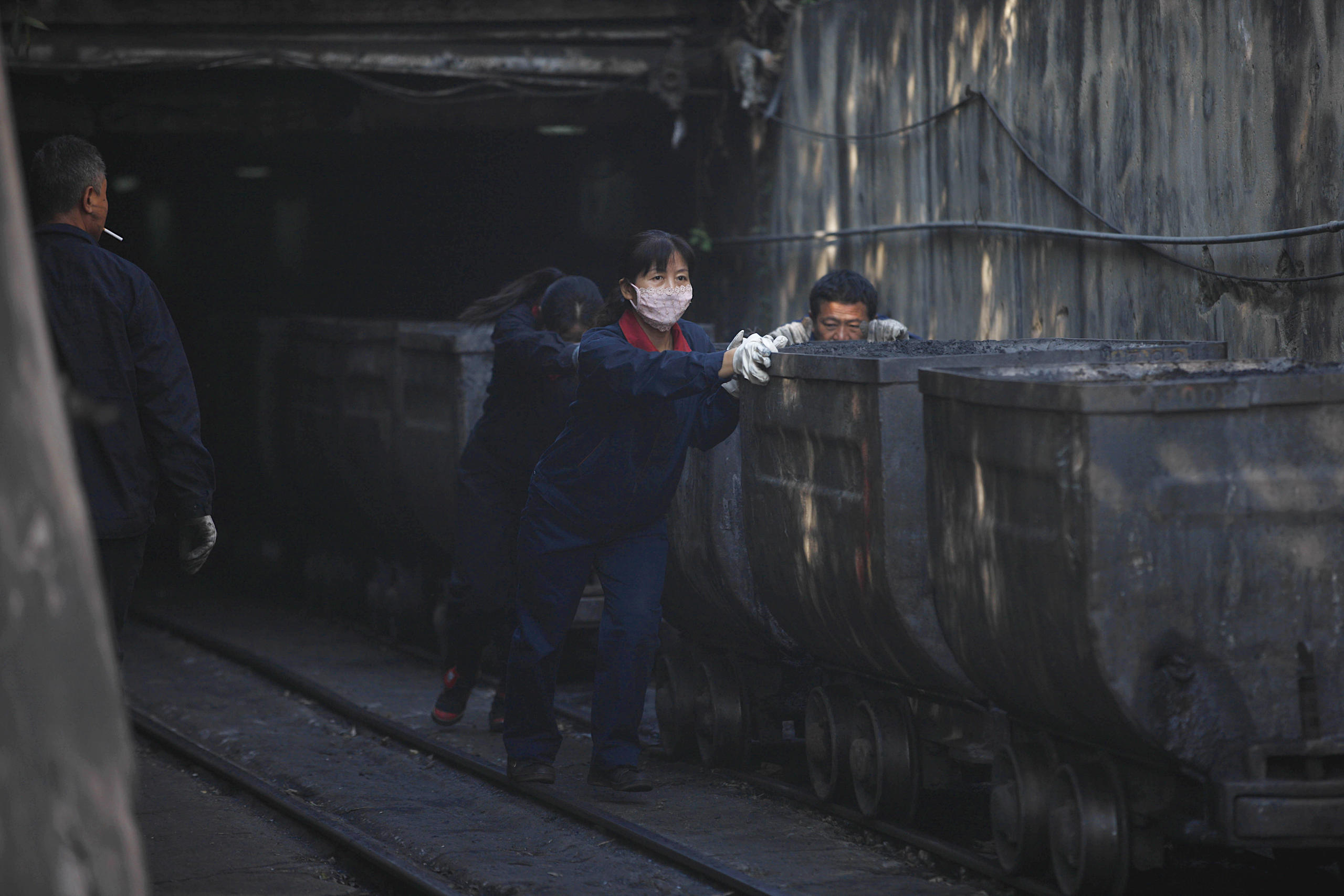 <p>Coal mine workers in the eastern Chinese city of Huaibei, Anhui province. China has announced a new plan to reduce the concentration limit for coal mine gas emissions (principally methane) from 30% to 8% (Image: Imaginechina / Alamy)</p>