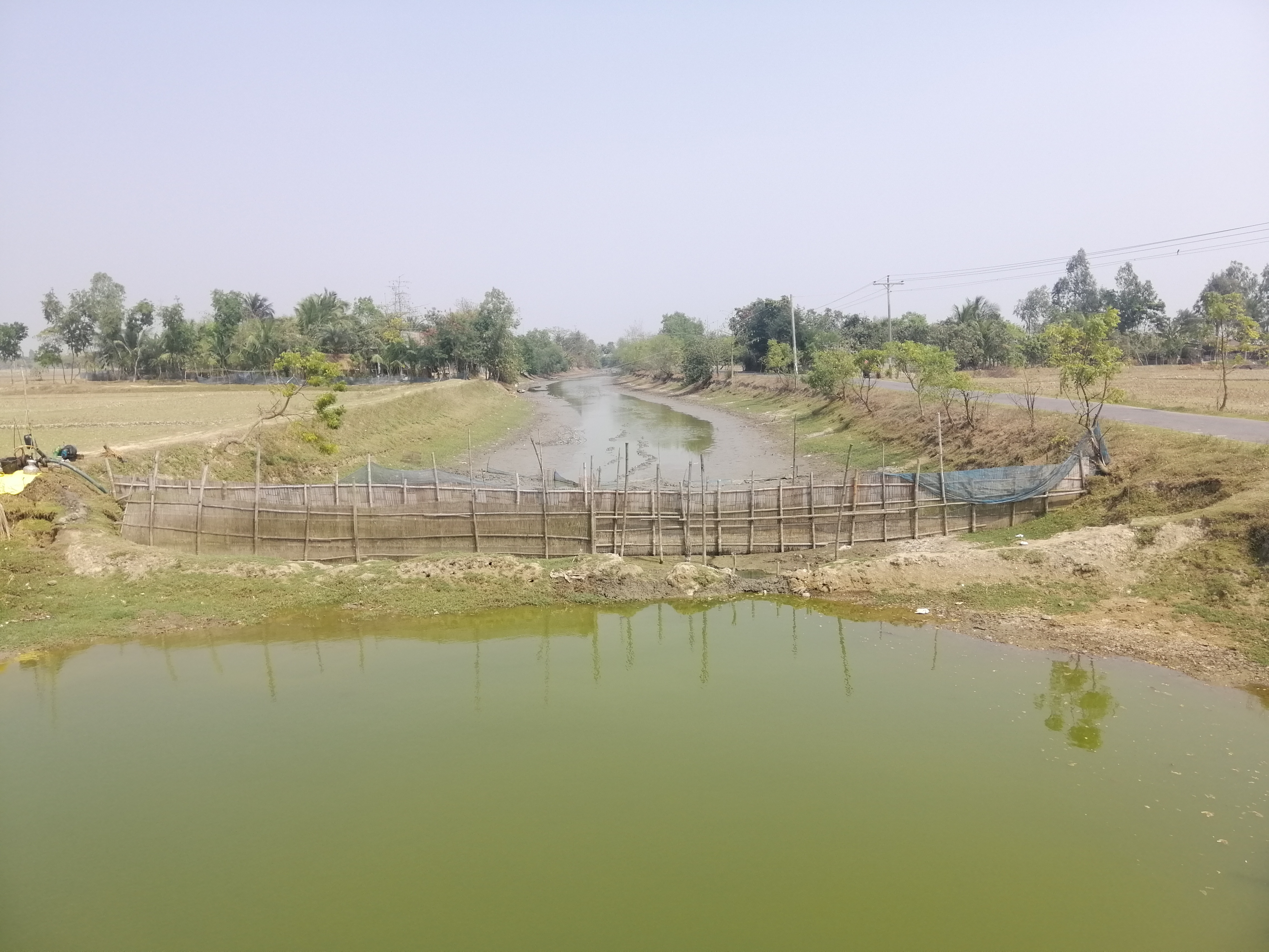 Leased canals are often used for aquaculture, like this section that has been illegally obstructed to support shrimp farming, effectively blocking seasonal canal flow