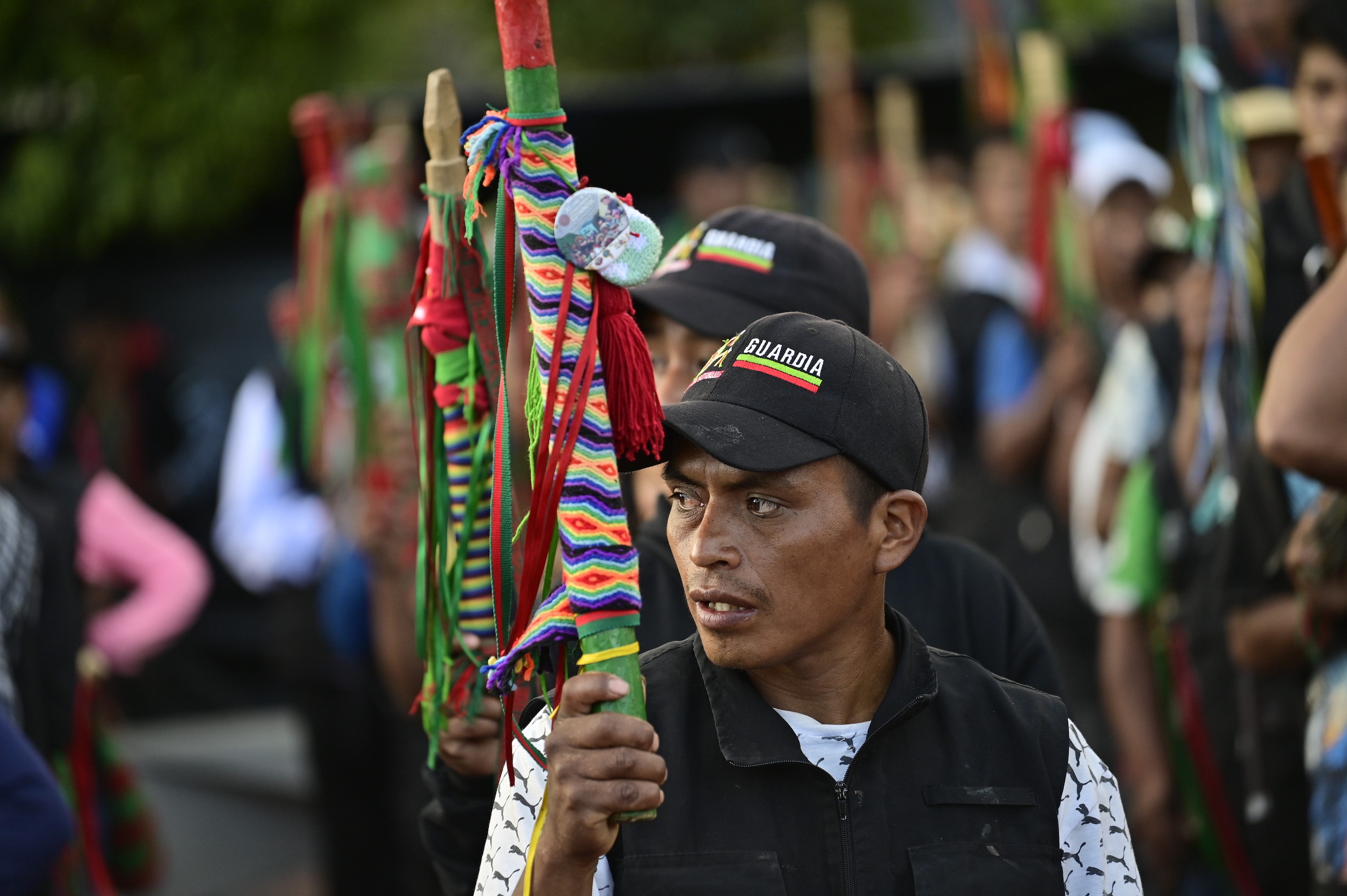 <p>Members of the Colombian Indigenous Guard, a civil and humanitarian organisation created to peacefully defend the rights and territory of communities, at a march in September 2023 supporting the country’s president, Gustavo Petro (Image: <a href="https://www.flickr.com/photos/197399771@N06/53216435306/in/album-72177720311490476">Cristian Garavito </a>/ <a href="https://flickr.com/people/197399771@N06/">Presidencia de Colombia</a>, <a href="https://creativecommons.org/publicdomain/mark/1.0/">PDM</a>)</p>