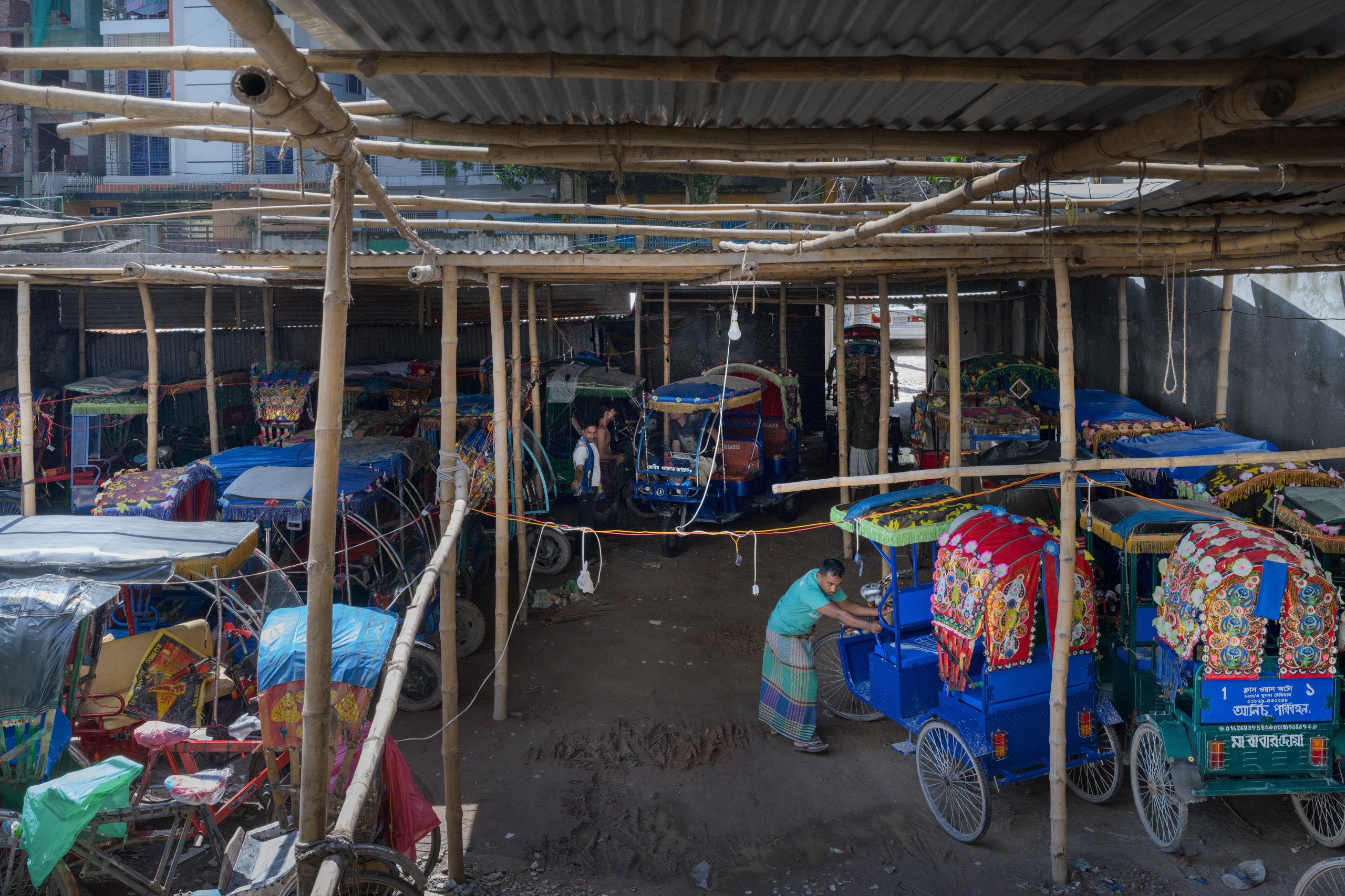 garage of pedal rickshaws