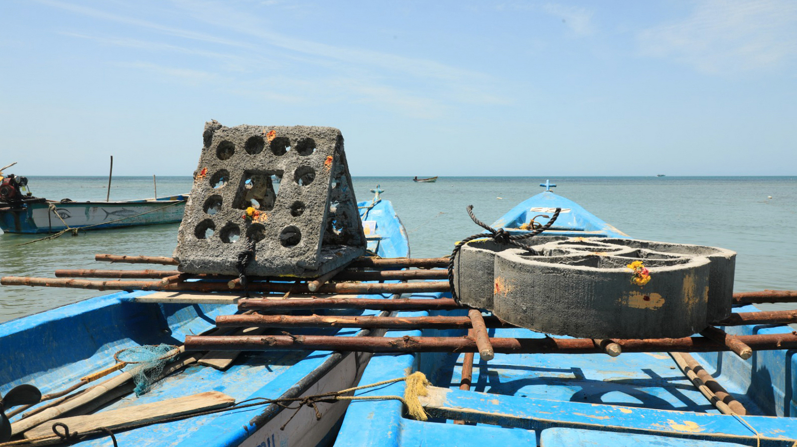 concrete blocks loaded on boats