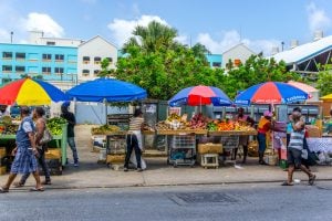 people walking near street market stalls