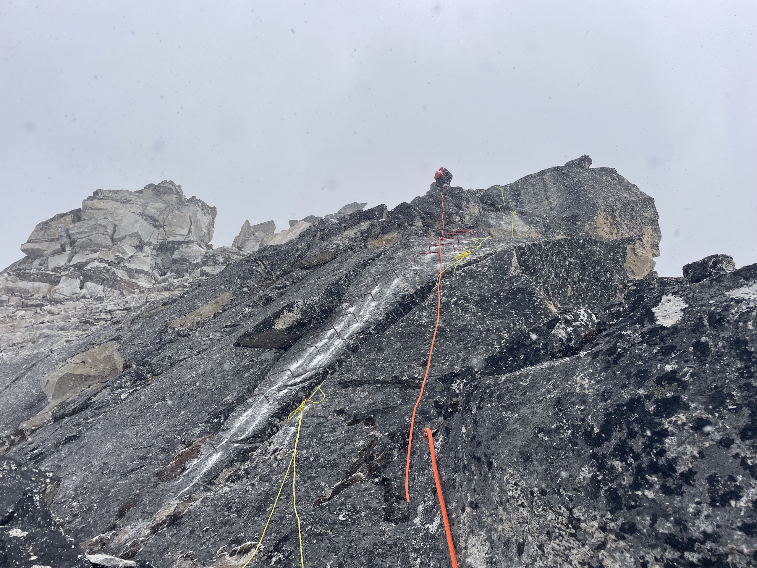 ropes attached to large rock face