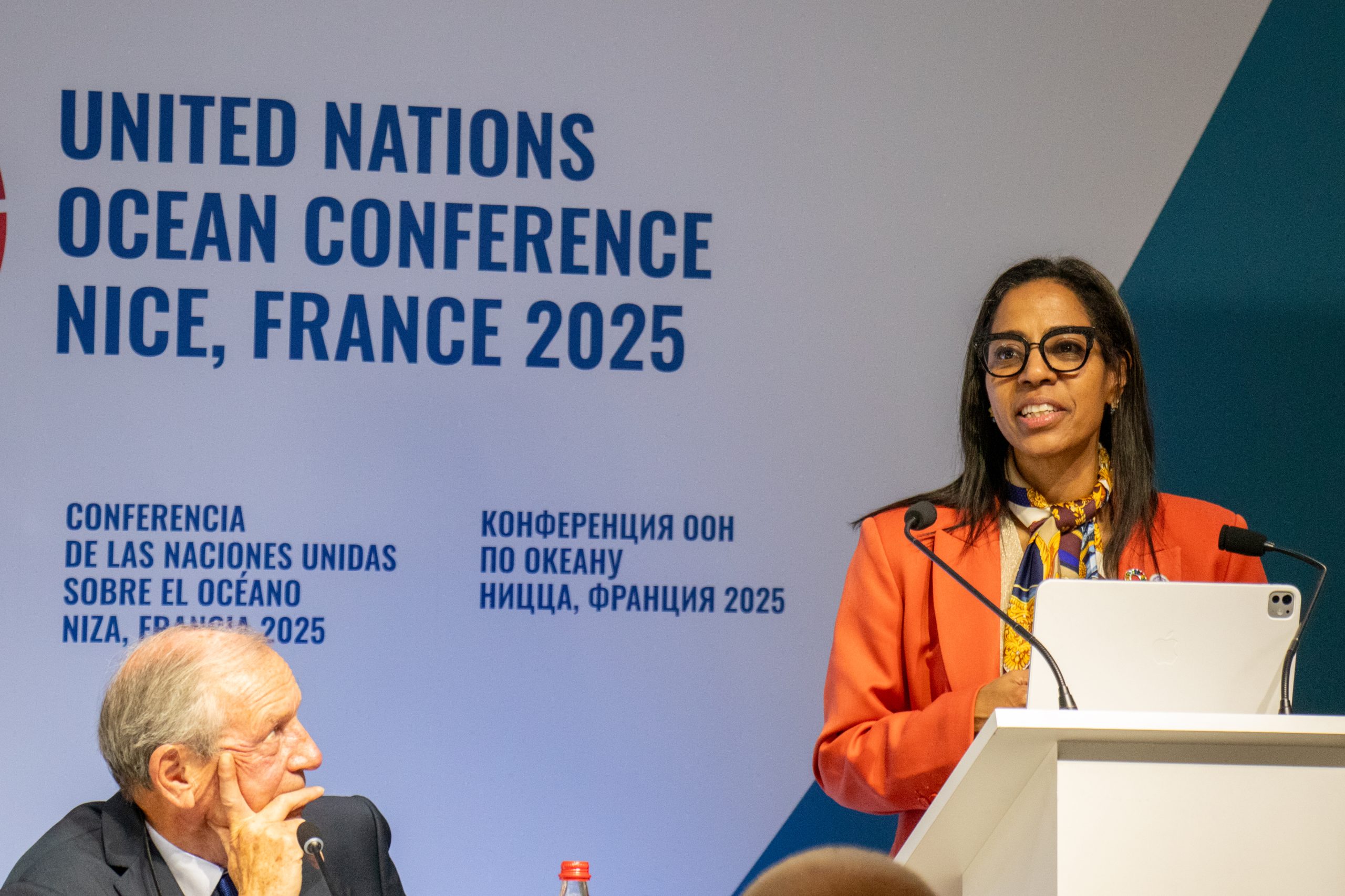Leticia Carvalho behind lectern 