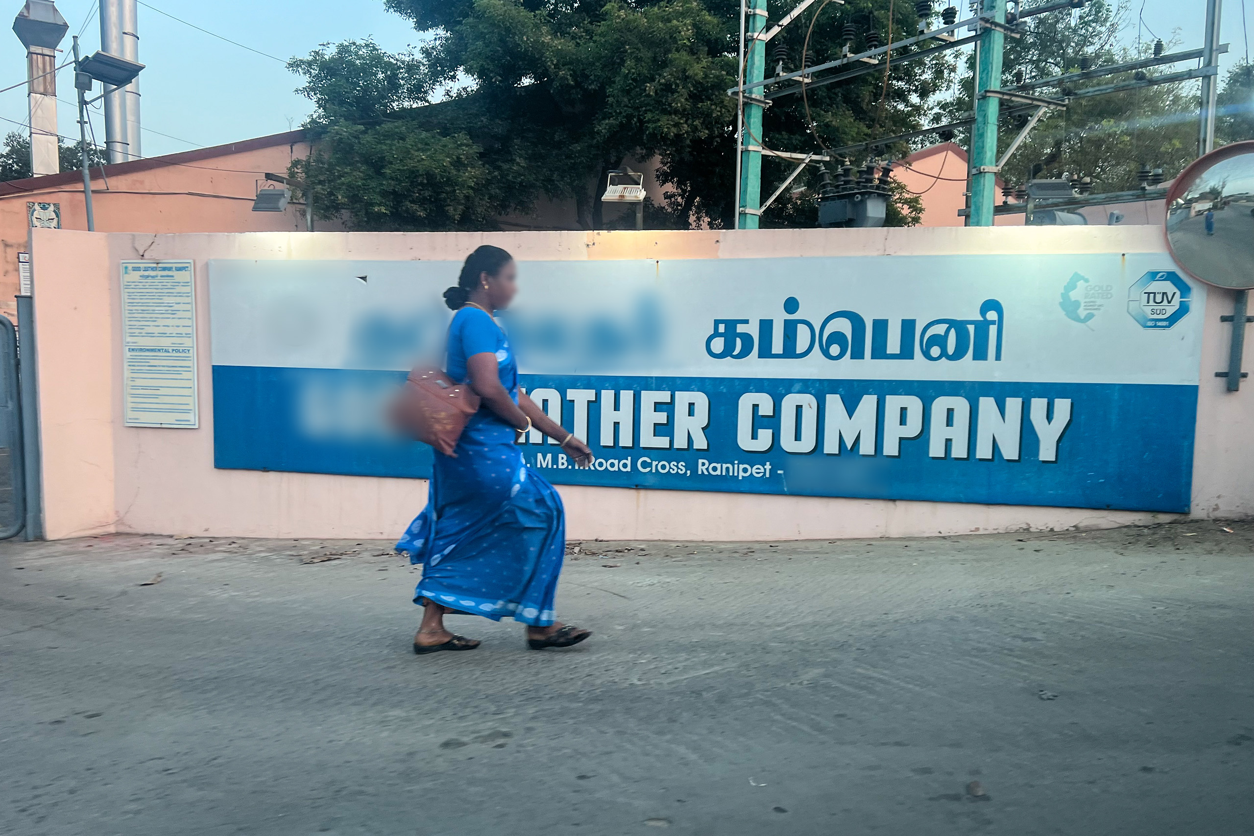 woman walking on concrete outdoors