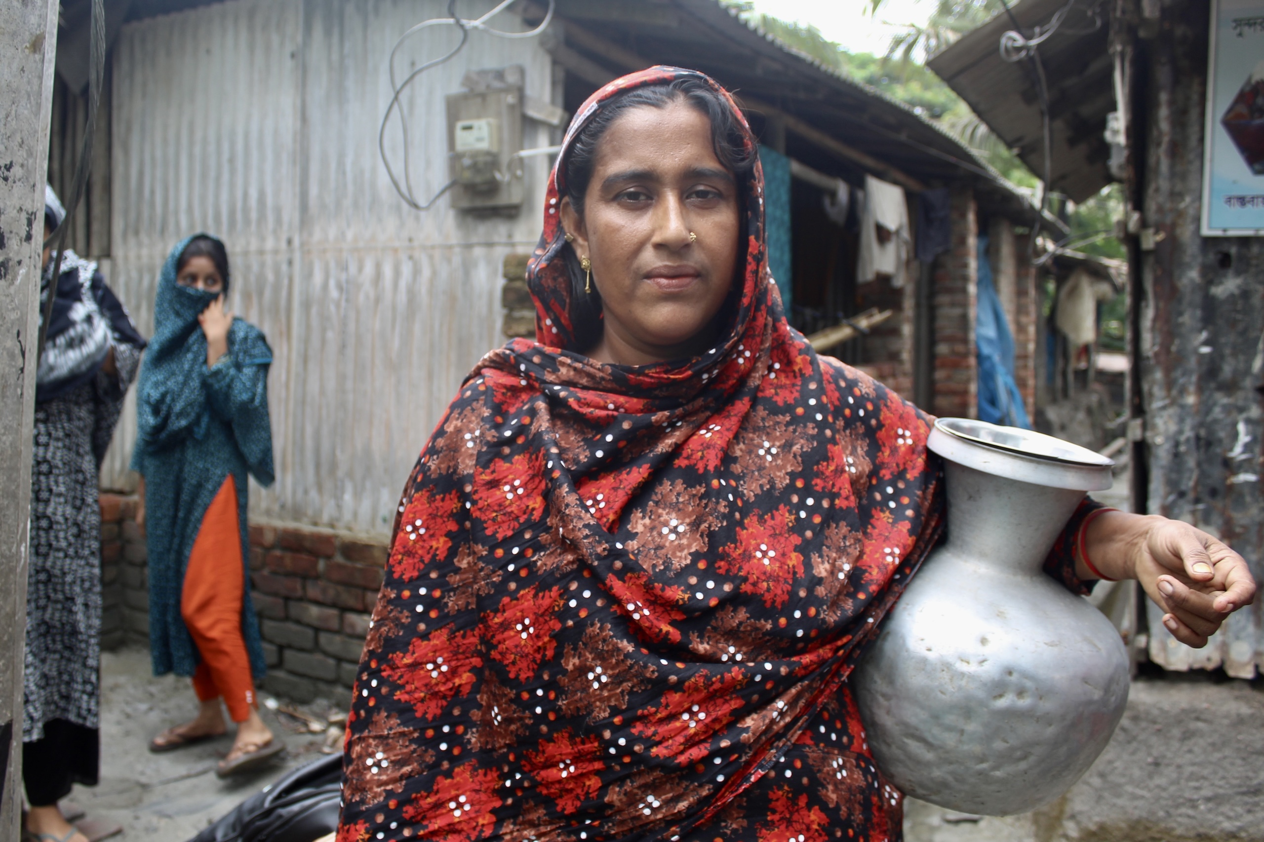 woman holding empty vessel