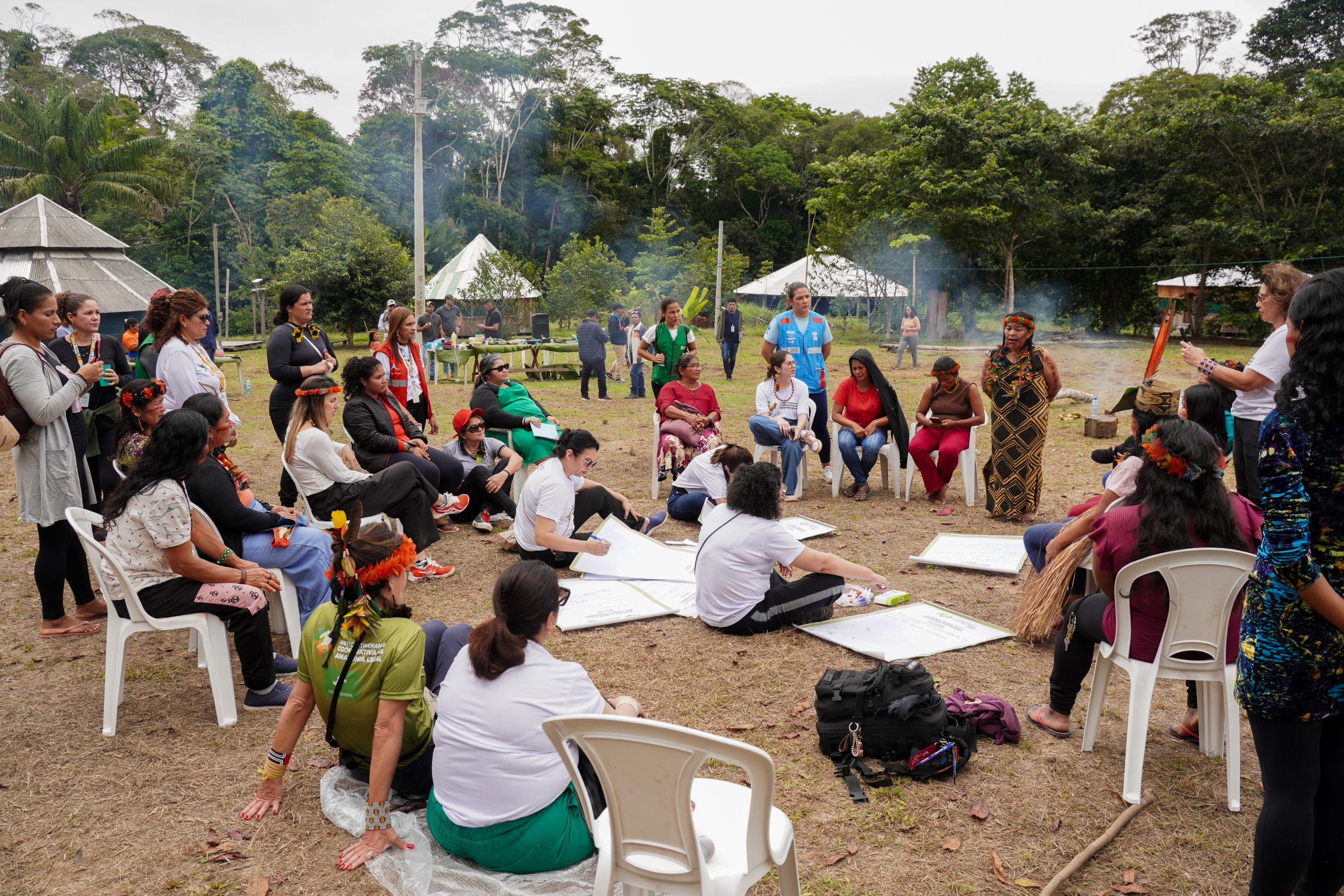 group of people gathered in field