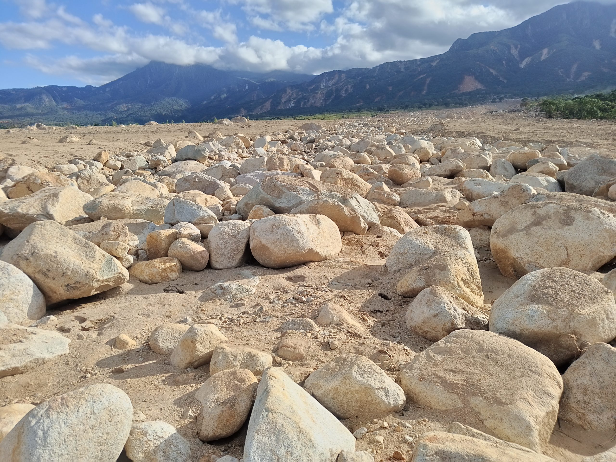 large cluster of boulders on flat ground