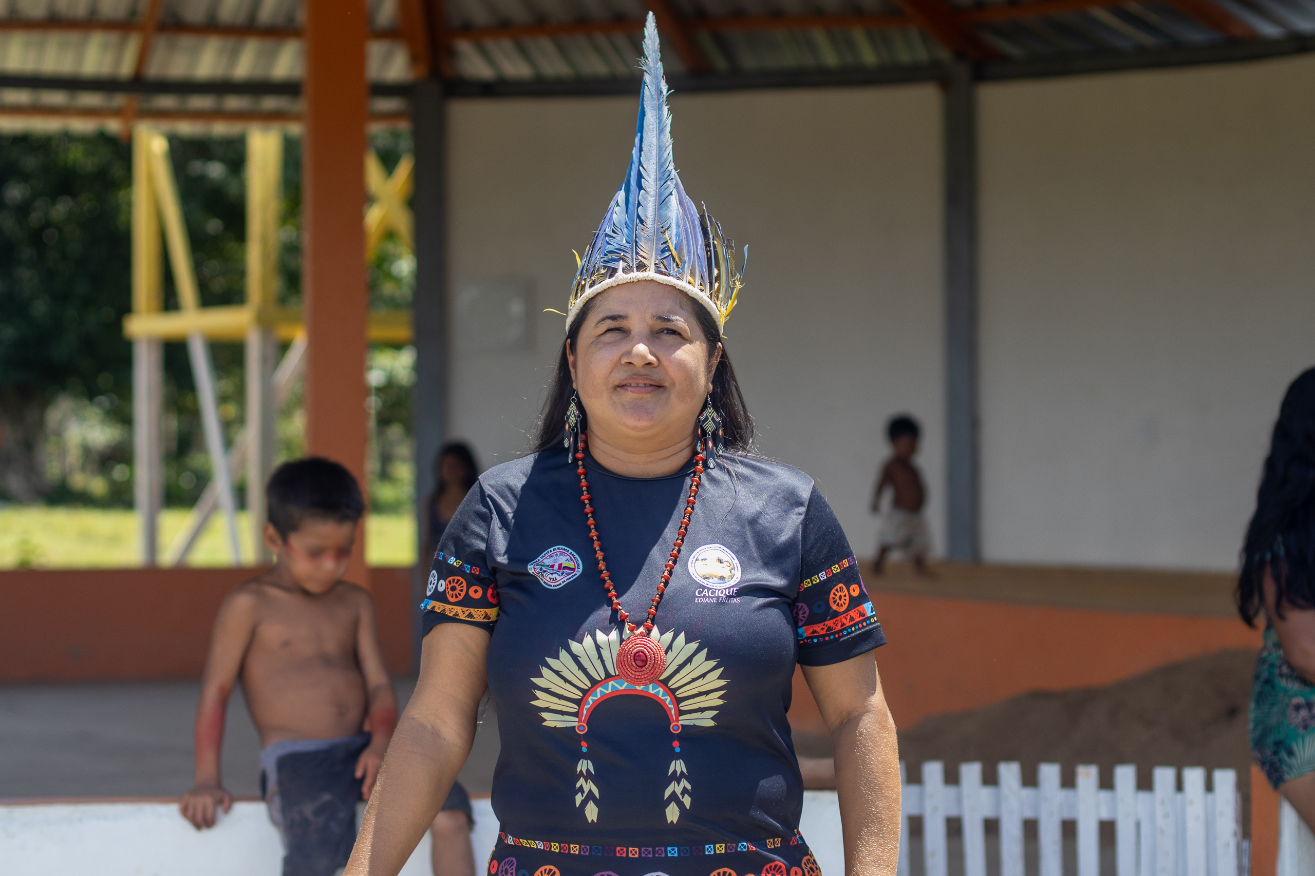 woman wearing feathered headwear