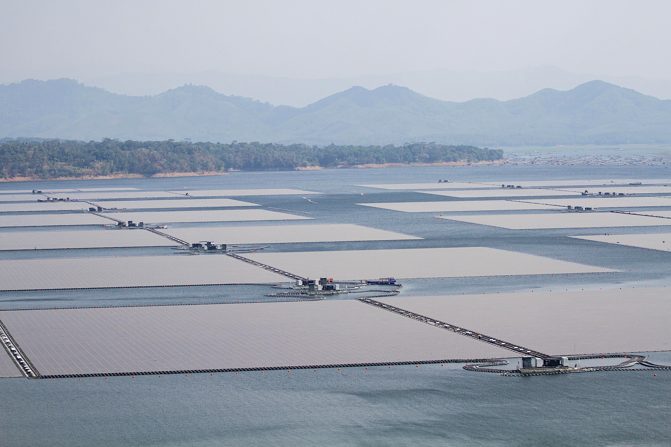 <p>A floating solar installation behind the Cirata hydropower dam, 100km south-east of Jakarta (Image: ZUMA Press / Alamy)</p>