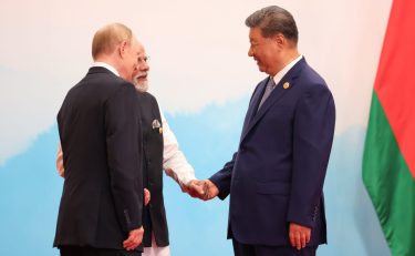Chinese President Xi Jinping, right, Indian Prime Minister Narendra Modi, center, and Russian President Vladimir Putin, left