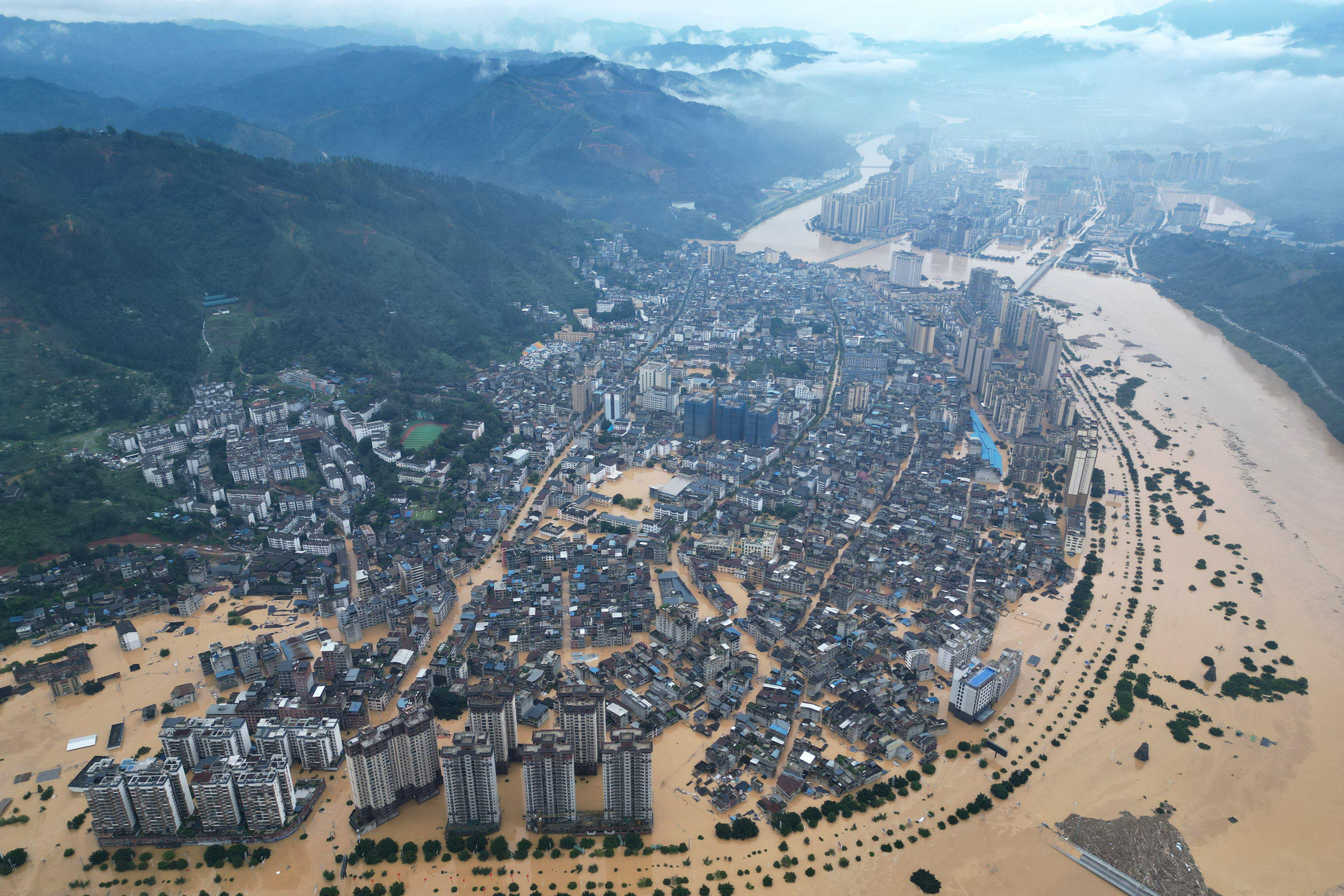 <p>Severe flooding in Rongjiang county, Guizhou province, in June 2025 (Image: Cynthia Lee / Alamy)</p>