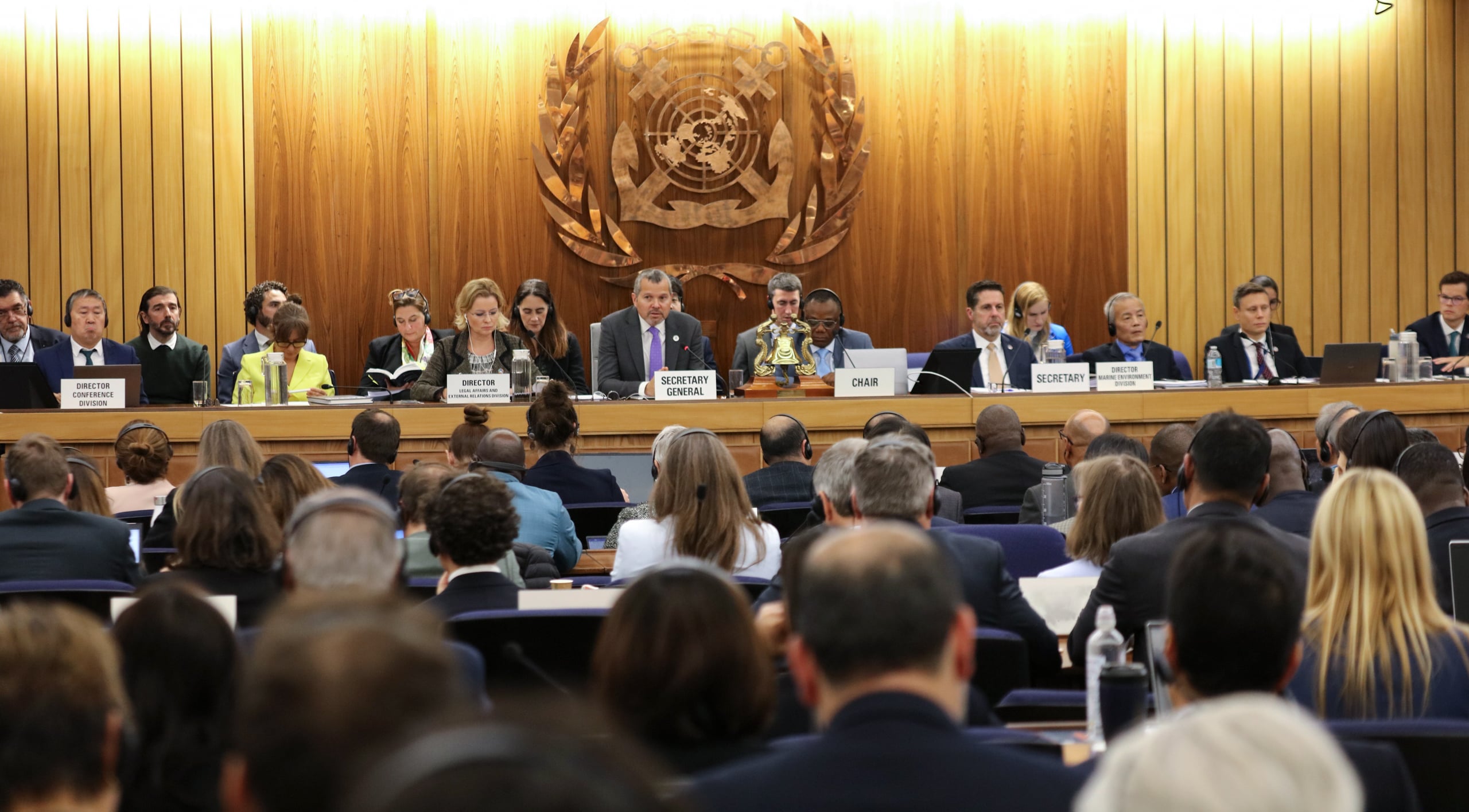 seated crowd facing seated panel