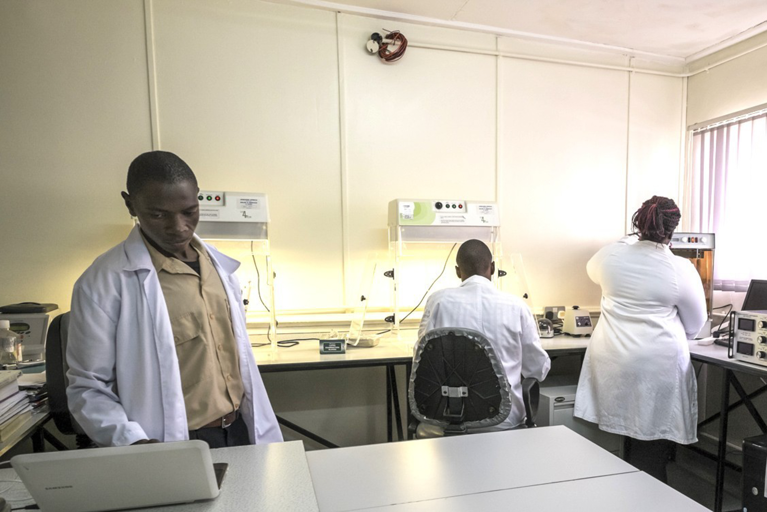 people in white lab coats