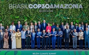 Group of leaders in formal attire standing together at the Brasil COP30 summit