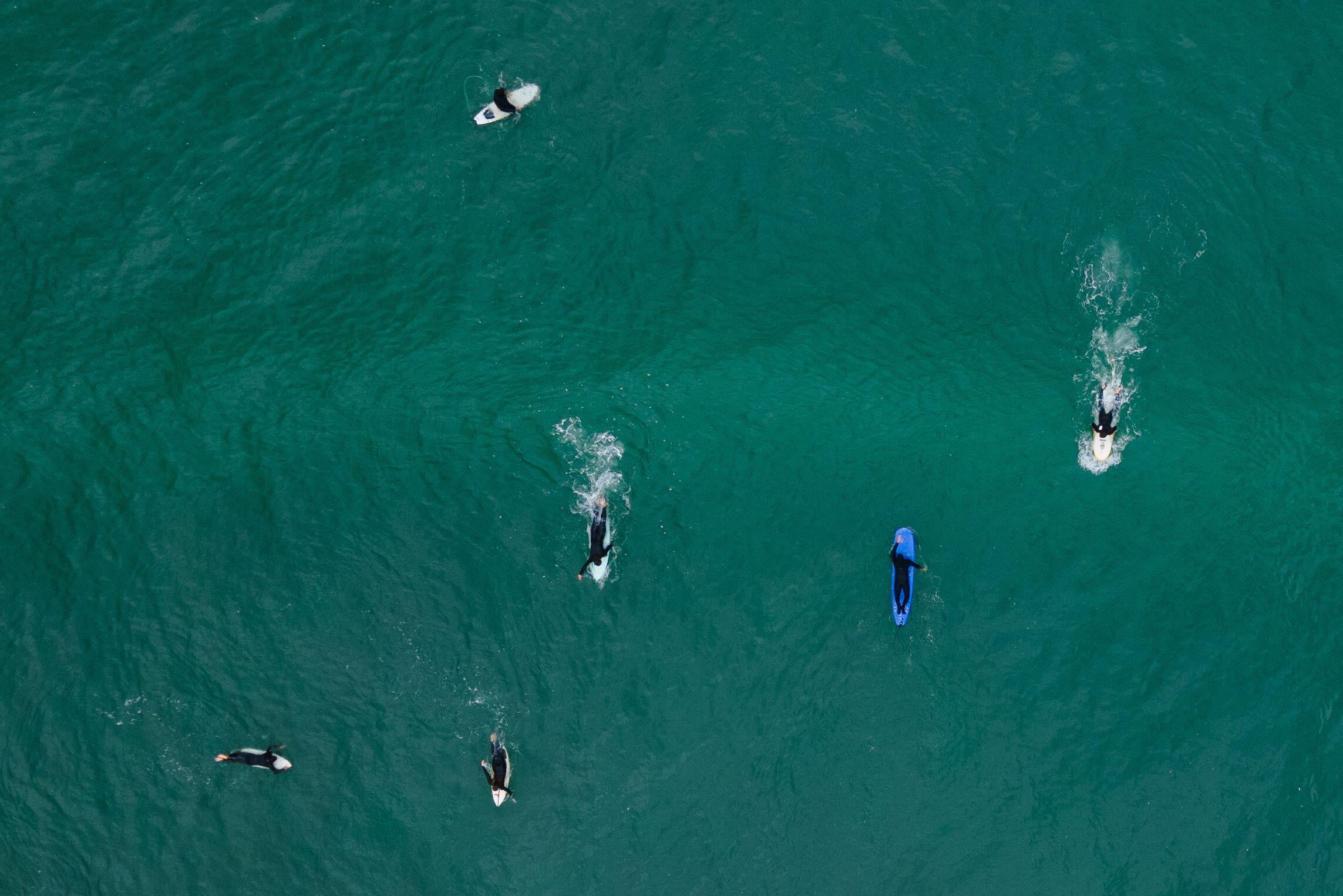 <p>Surfers at Punta de Lobos, central Chile, which became a World Surfing Reserve after a community campaign (Image: Matias Basualdo / ZUMA Press Wire / Alamy)</p>