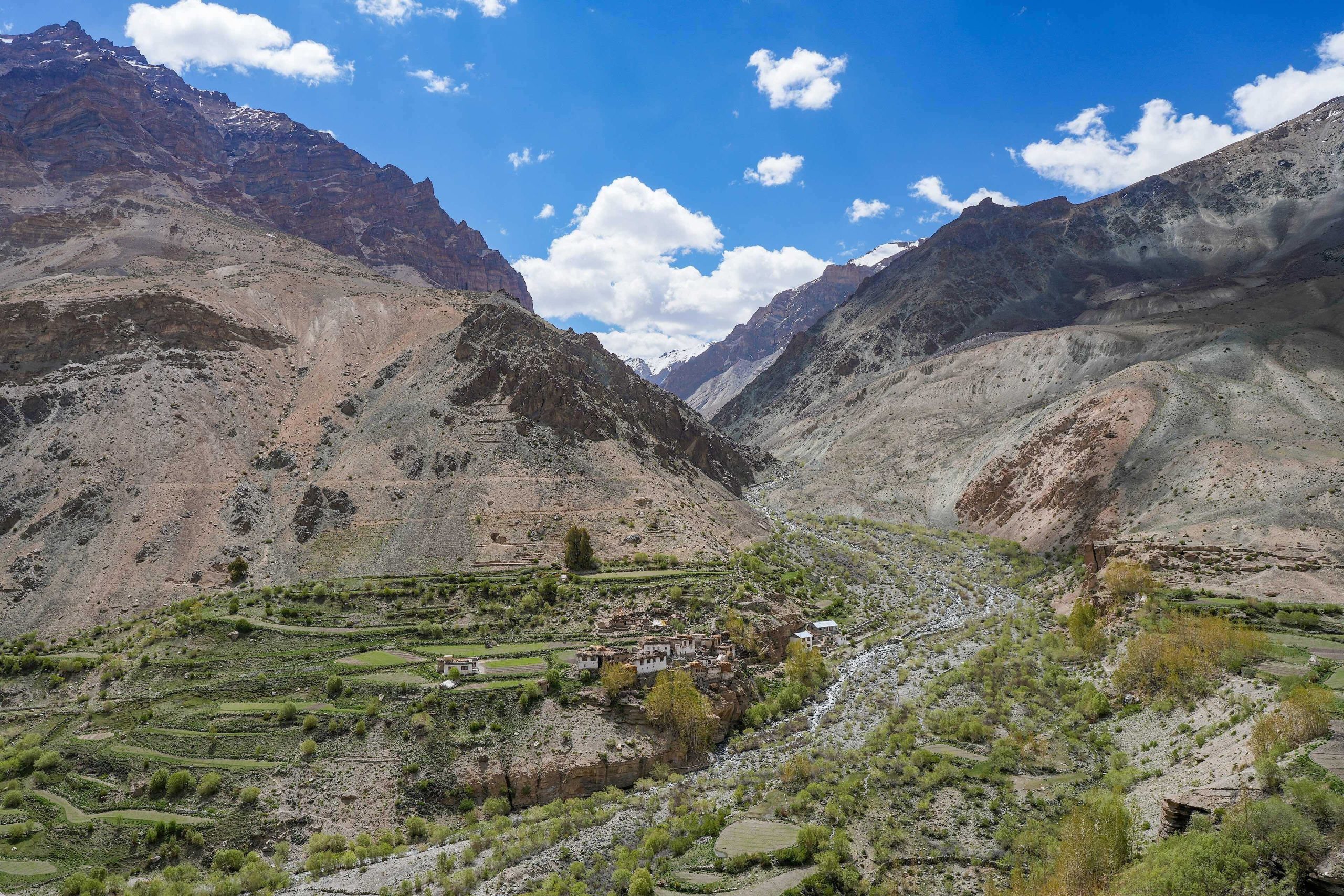 A valley framed by rugged mountains