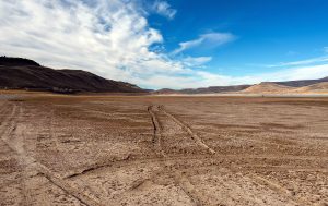 tyre tracks on dry riverbed