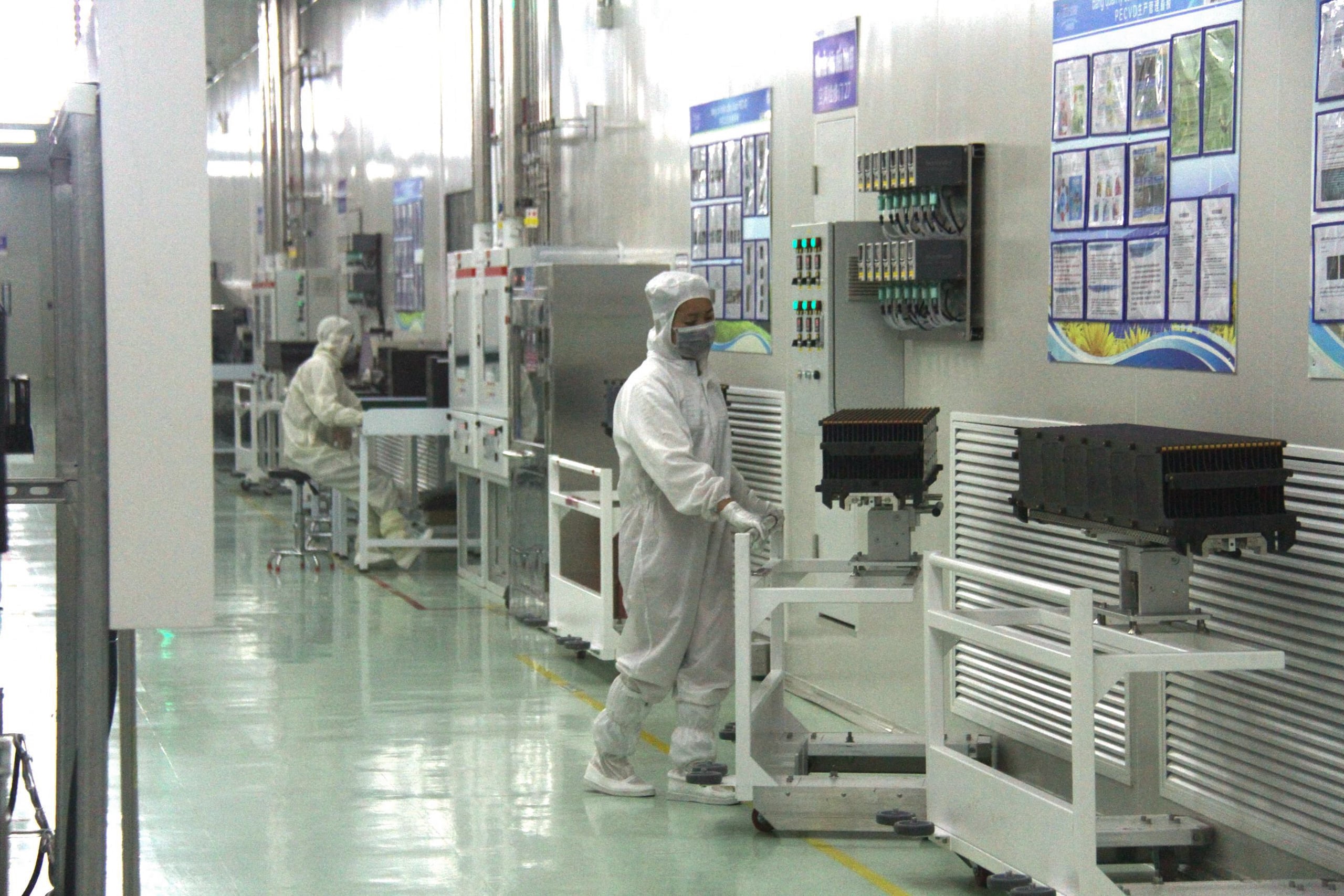 worker in factory hallway