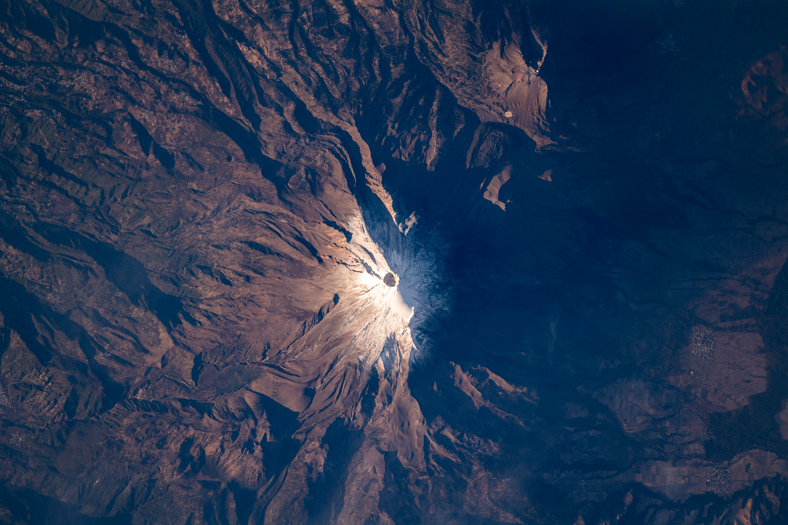 <p>Citlaltépetl, also known as the Pico de Orizaba, is an active volcano and Mexico’s highest peak, and home to Jamapa Glacier. Studies show this glacier – the country’s last remaining – is melting and facing extinction (Image: International Space Station / NASA)</p>
